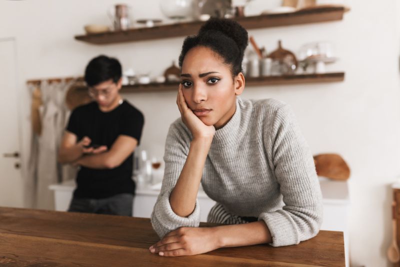 couple upset with each other in the kitchen