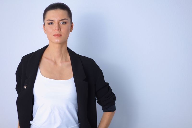 serious woman against a white background